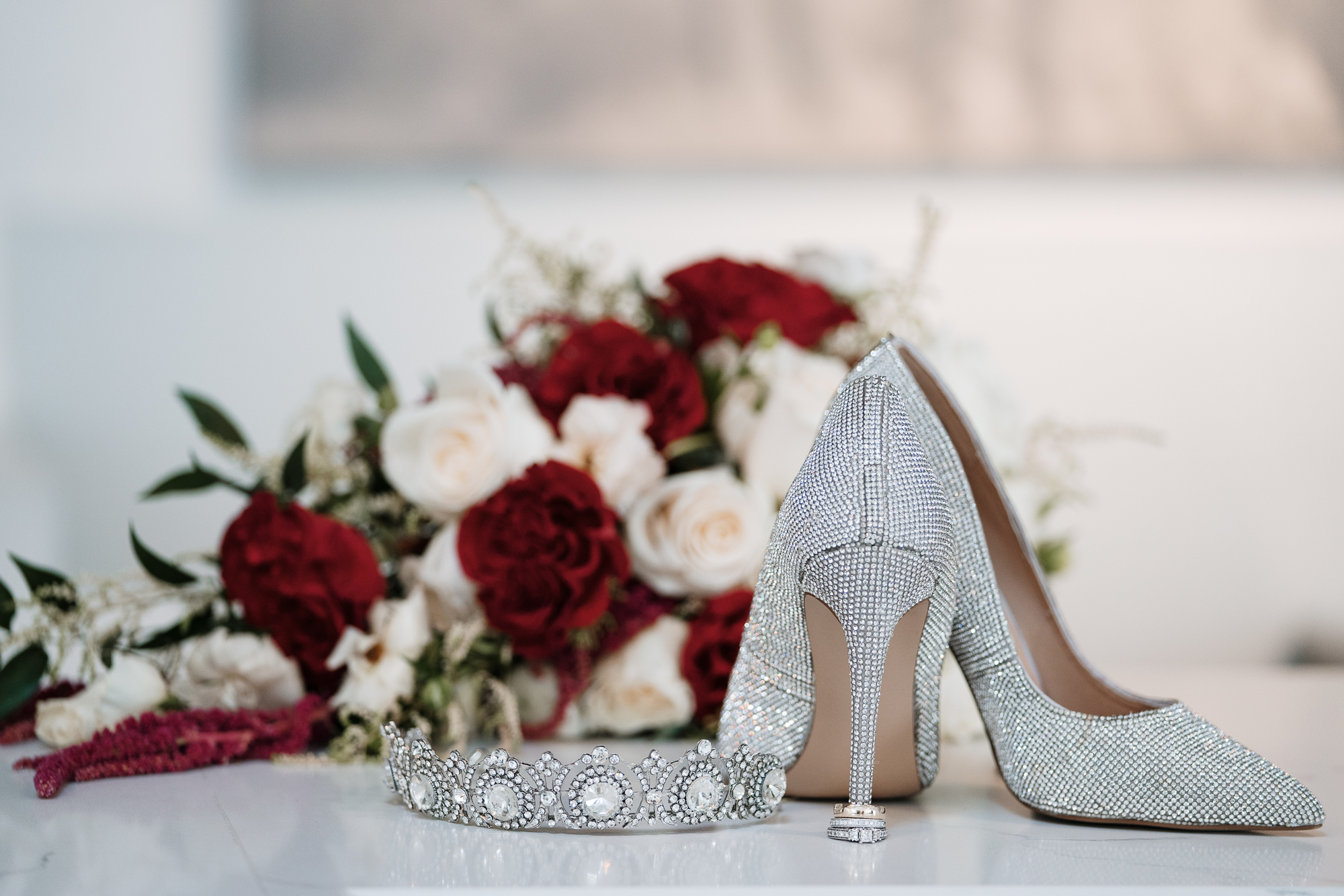 White bridal heels and bouquet