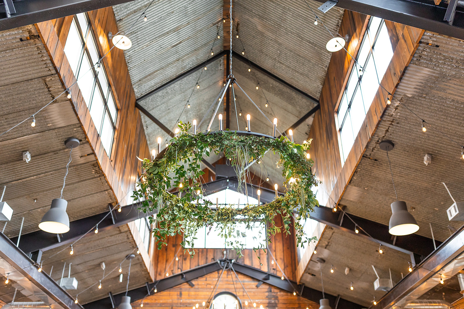rustic venue with floral chandelier